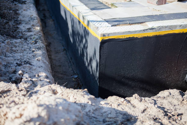Professional Interior Drainage System technician working in Taylorsville, KY
